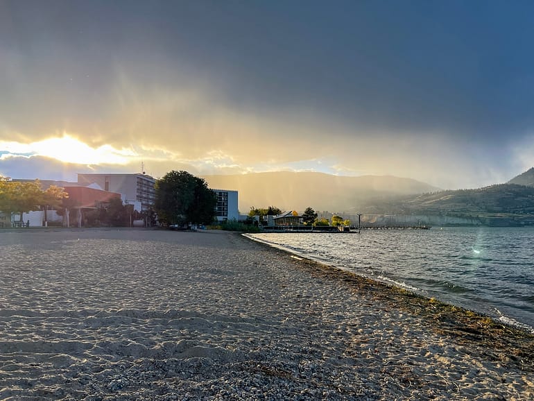 Moody picture of a storm rolling into a beach in Penticton BC - one of the best spots in BC