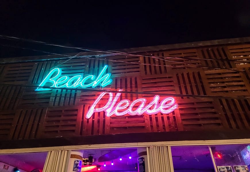 beach please neon sign